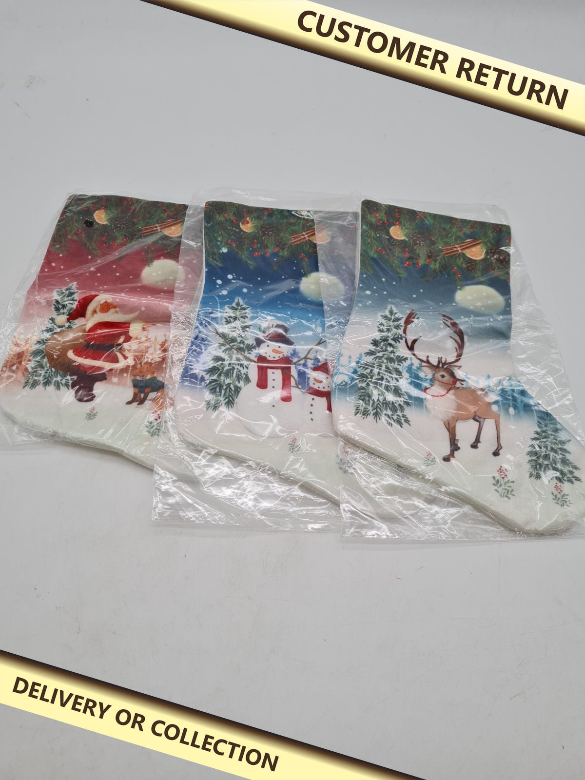 Set of 3 Christmas Stockings — photograph 1 — Customer return; auction delivery information shown on image