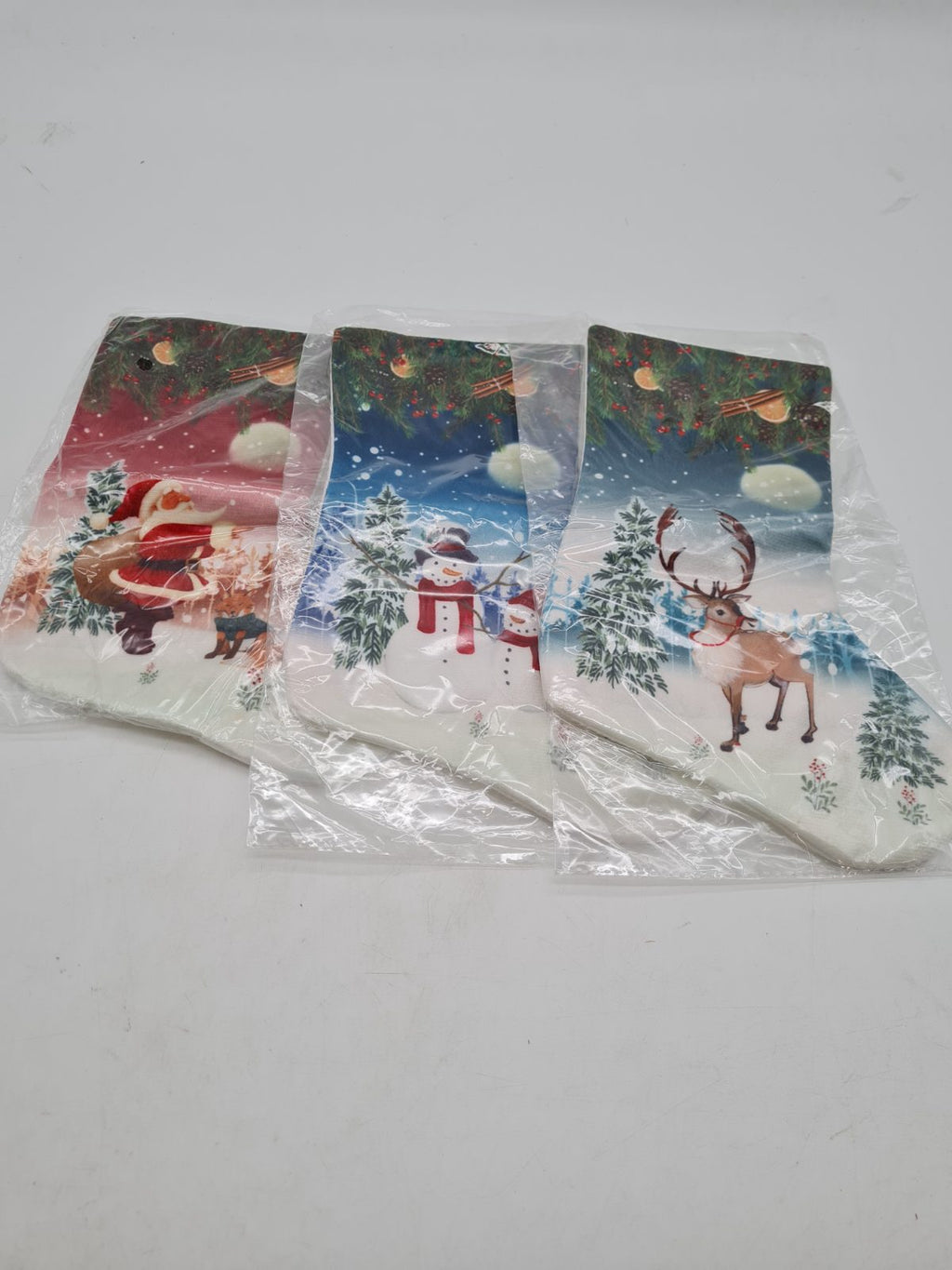 Set of 3 Christmas Stockings â€” photograph 1