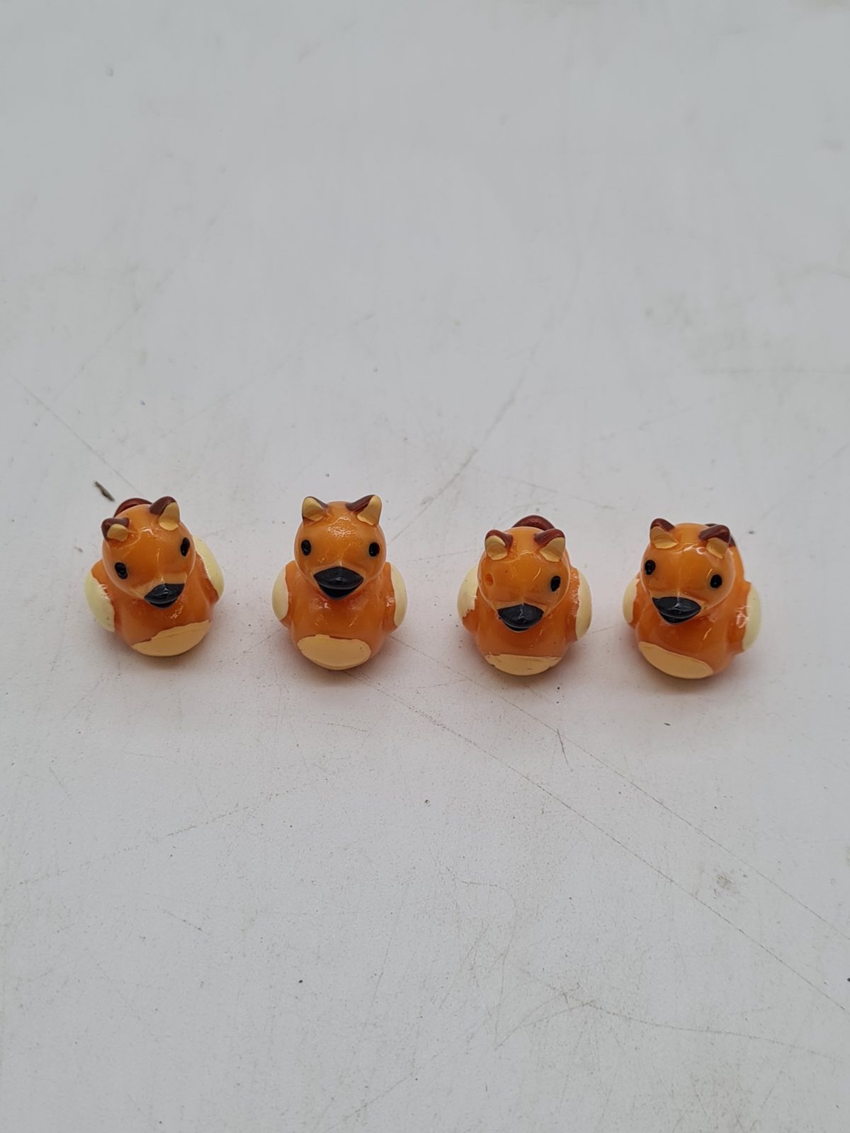 Set of Miniature resin Figurines ducks — photograph 1