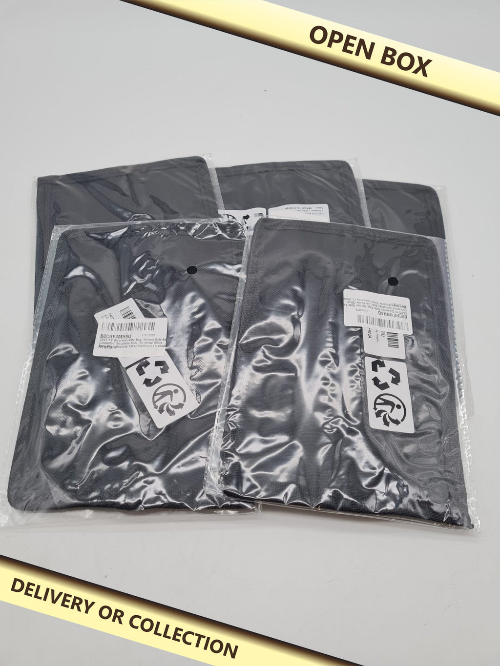 Hidden Diversion Safe Bag bundle â€” photograph 1 — Open box; auction delivery information shown on image