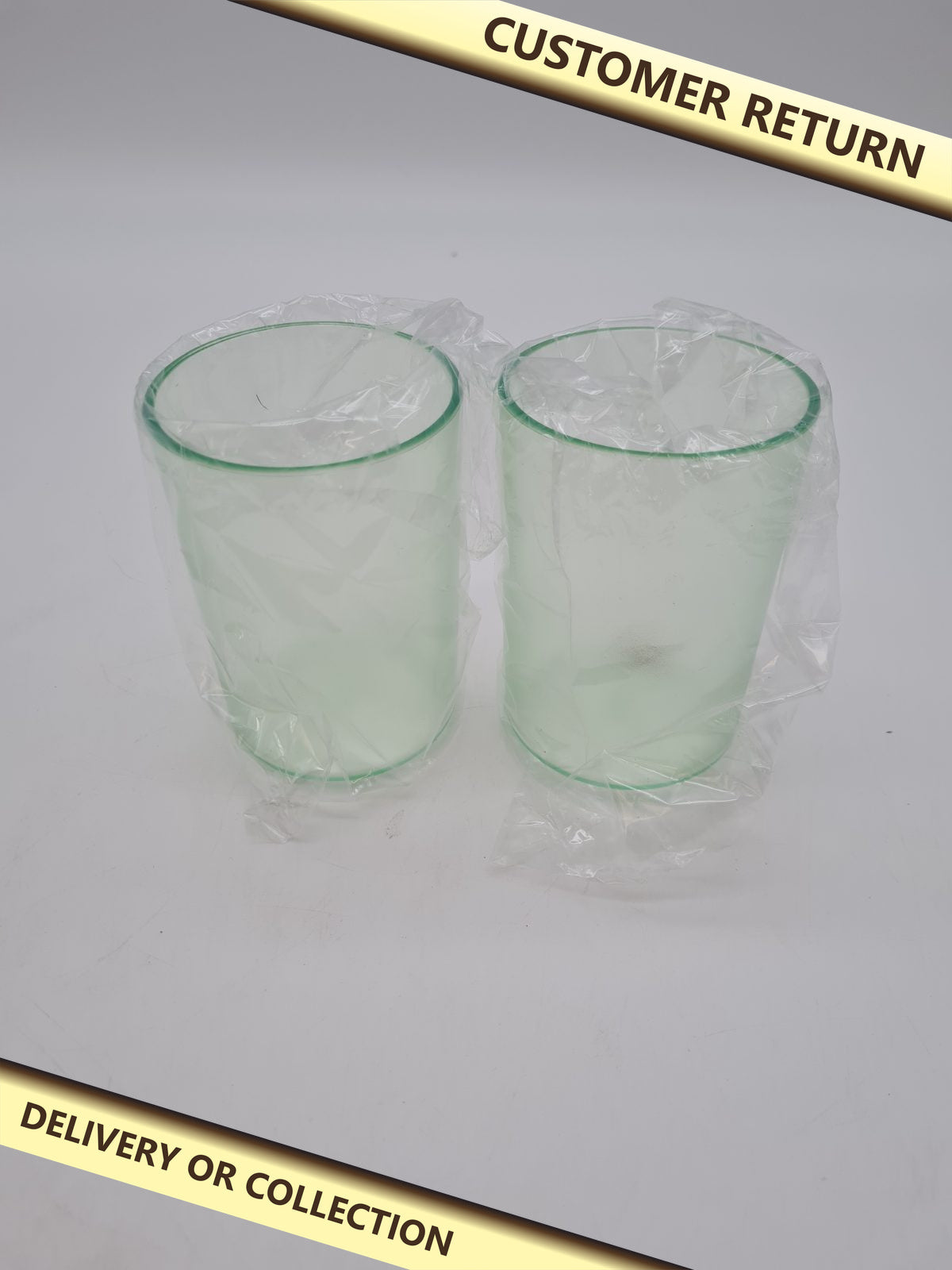Translucent  green Toothbrush Tumbler x2 â€” photograph 1 — Customer return; auction delivery information shown on image