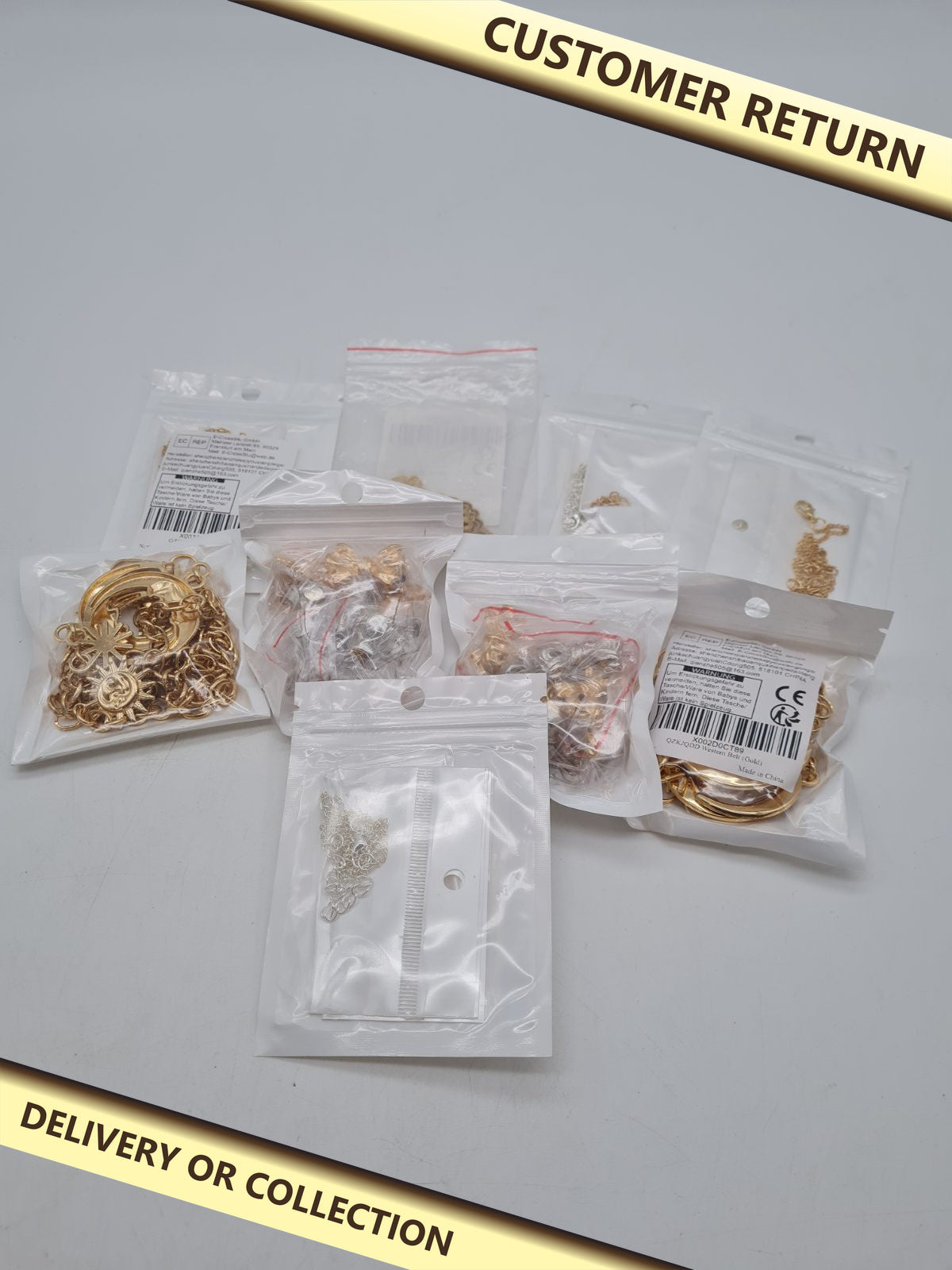 Jewellery bundle mixed â€” photograph 1 — Customer return; auction delivery information shown on image
