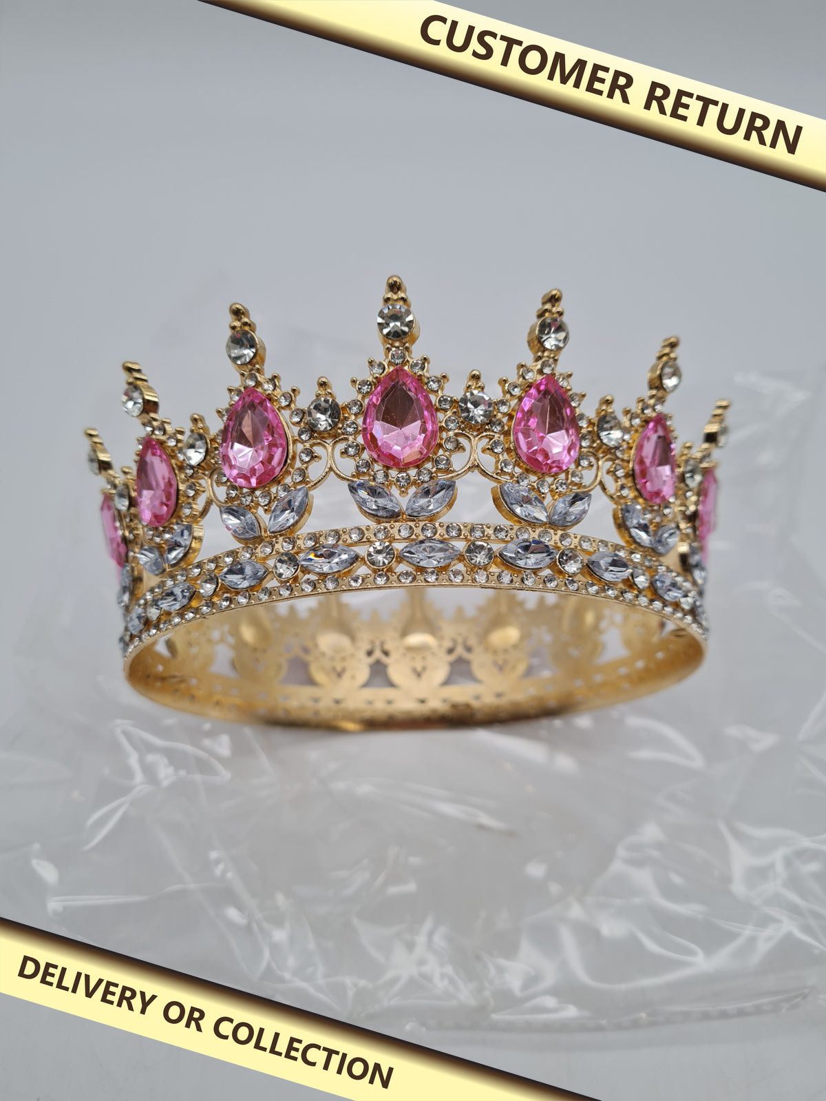 Gold-Tone Pink and Clear Stone Costume Crown Tiara — photograph 1 — Customer return; auction delivery information shown on image