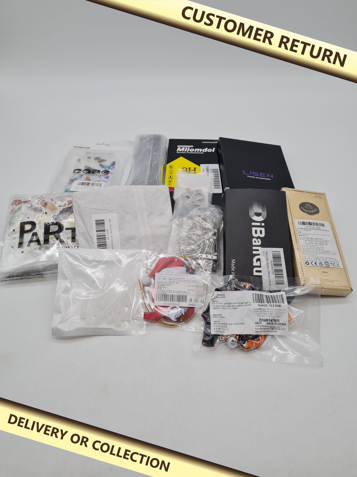 Mixed variety bundle mix â€” photograph 1 — Customer return; auction delivery information shown on image