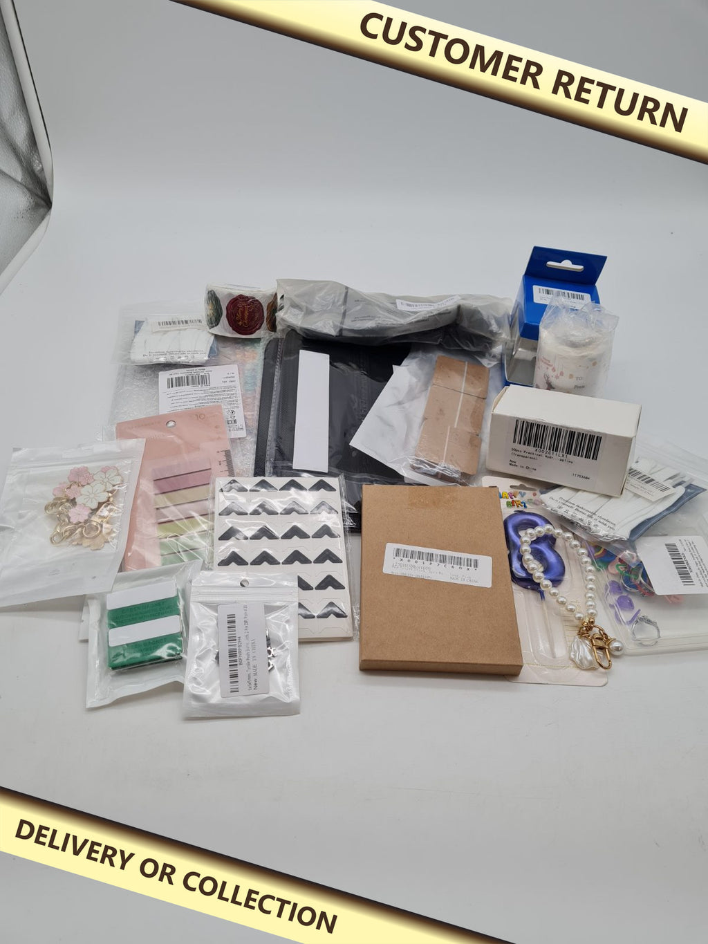 Mixed variety bundle â€” photograph 1 — Customer return; auction delivery information shown on image