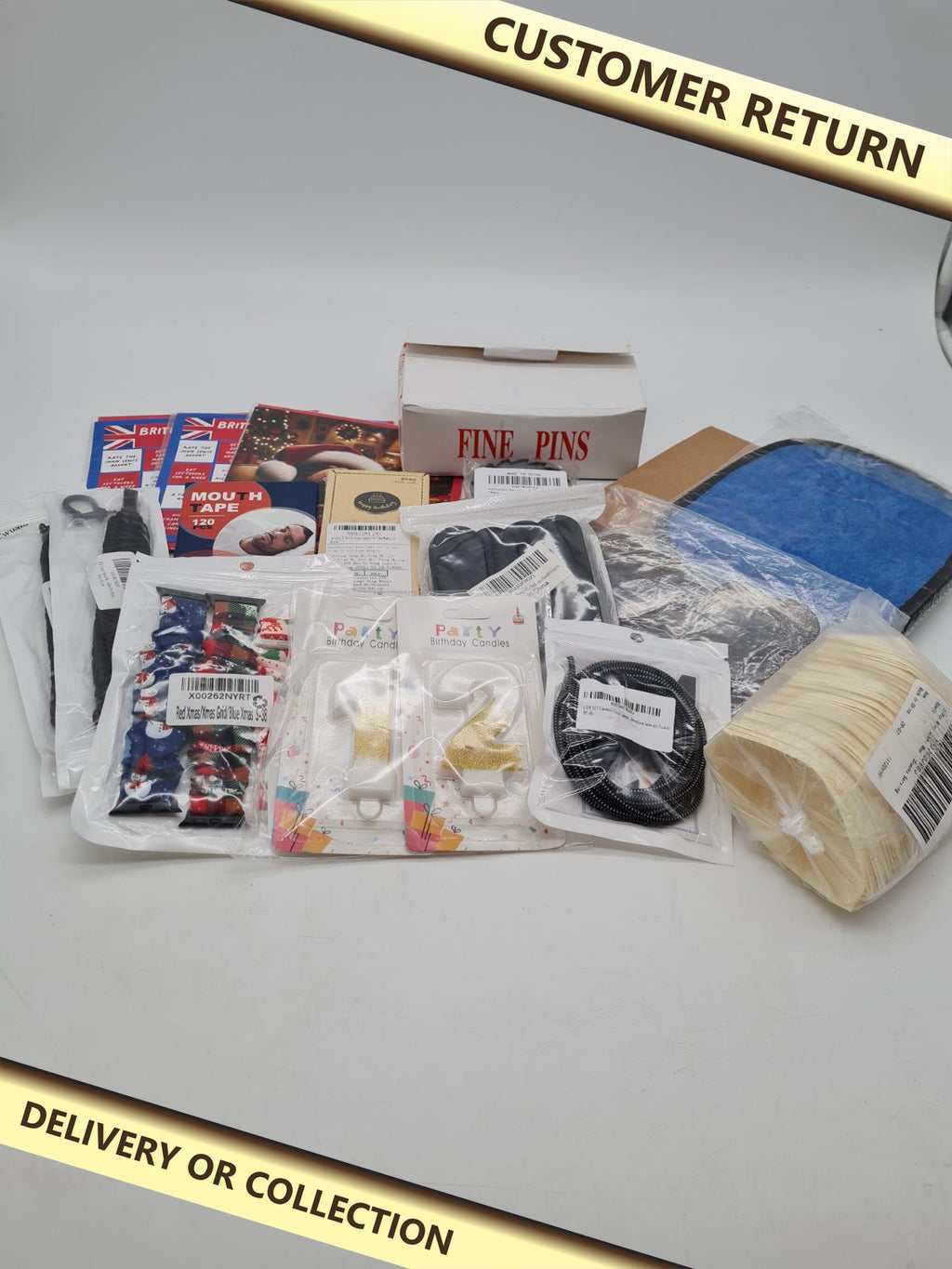 Variety bundle of mixed items — photograph 1 — Customer return; auction delivery information shown on image