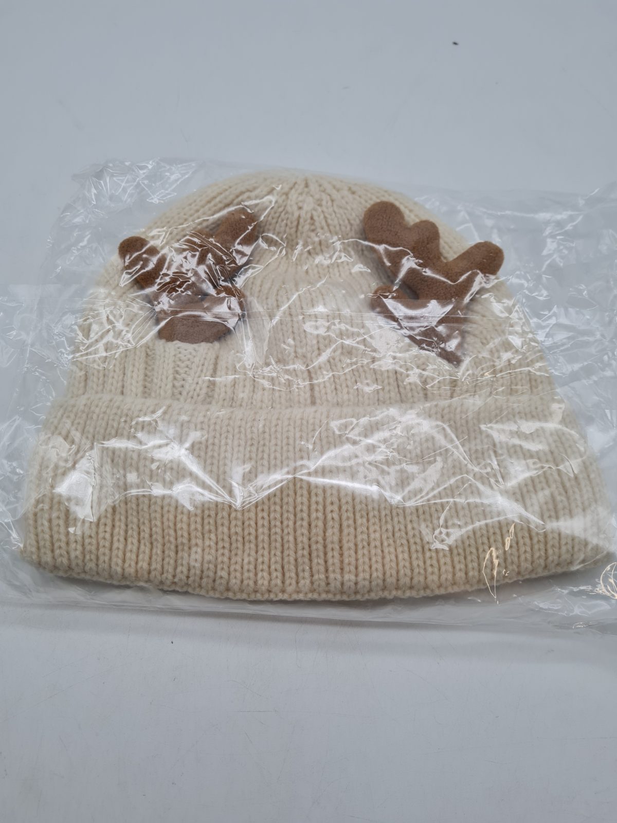 Knitted Reindeer Antler Beanie Hat â€” photograph 2