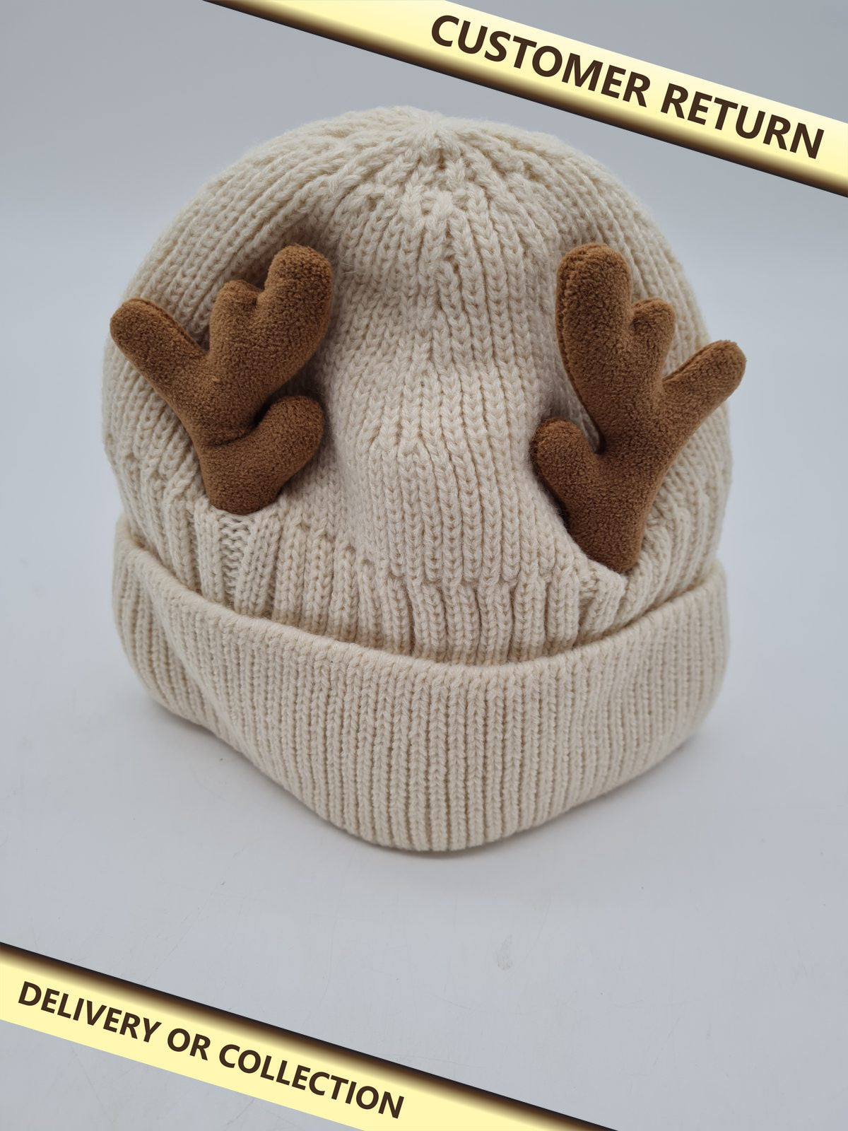 Knitted Reindeer Antler Beanie Hat â€” photograph 1 — Customer return; auction delivery information shown on image