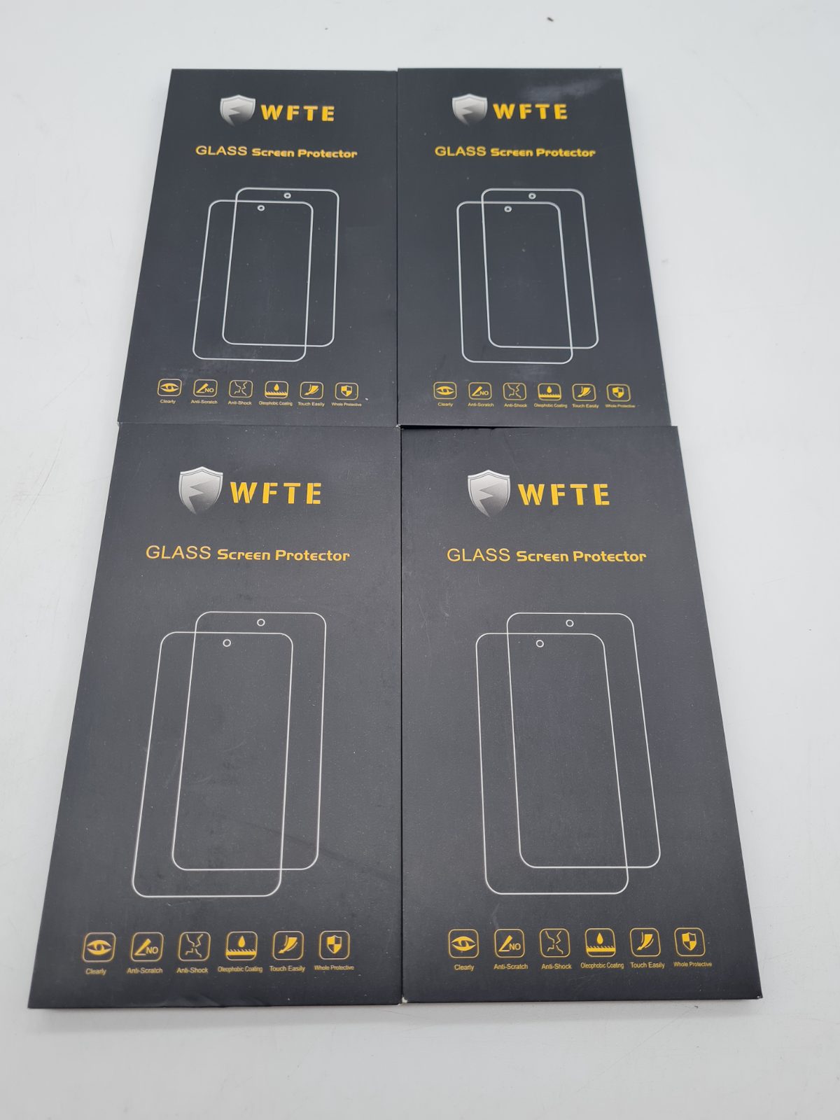 Bundle of 4 WFTE Glass Smartphone Screen Protectors â€” photograph 2