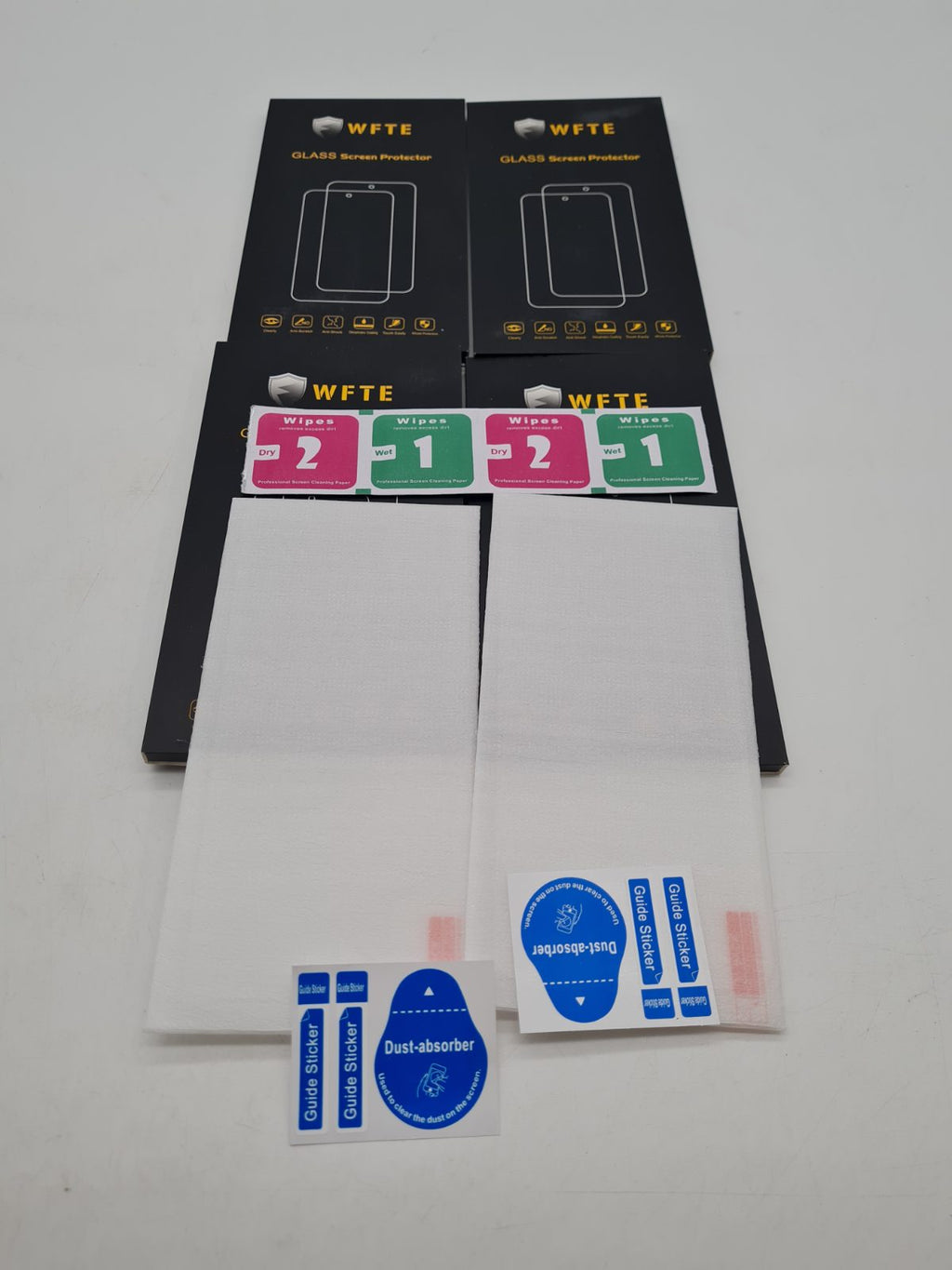 Bundle of 4 WFTE Glass Smartphone Screen Protectors â€” photograph 1