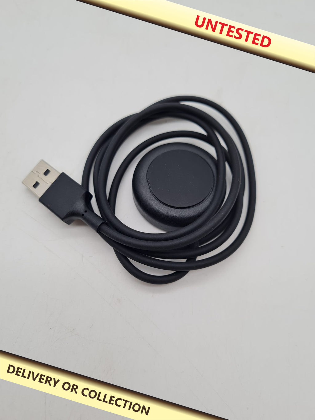USB-A Smartwatch Charging Cable â€” photograph 1 — Untested; auction delivery information shown on image