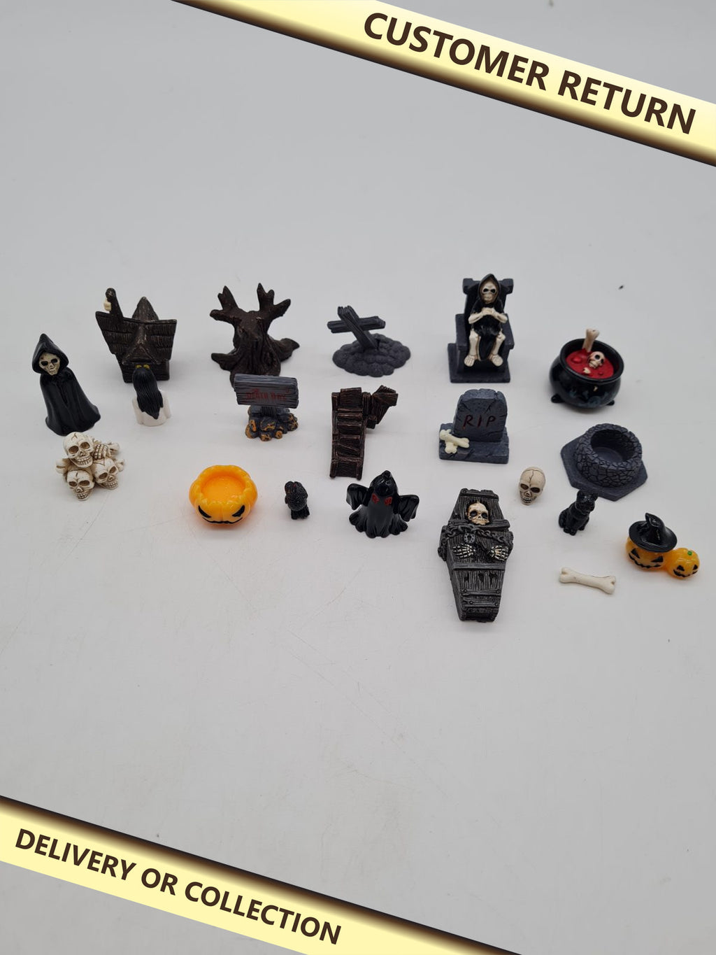 21-Piece Halloween Miniature Garden Ornament Set â€” photograph 1 — Customer return; auction delivery information shown on image