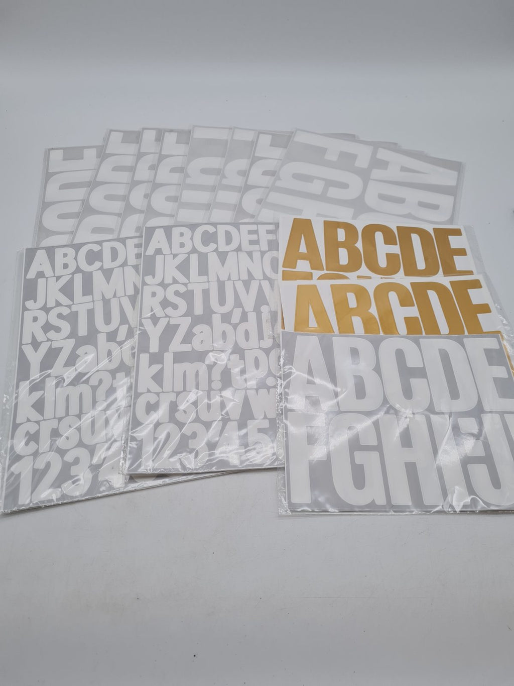 Bundle of Assortment of letter stickers — photograph 1