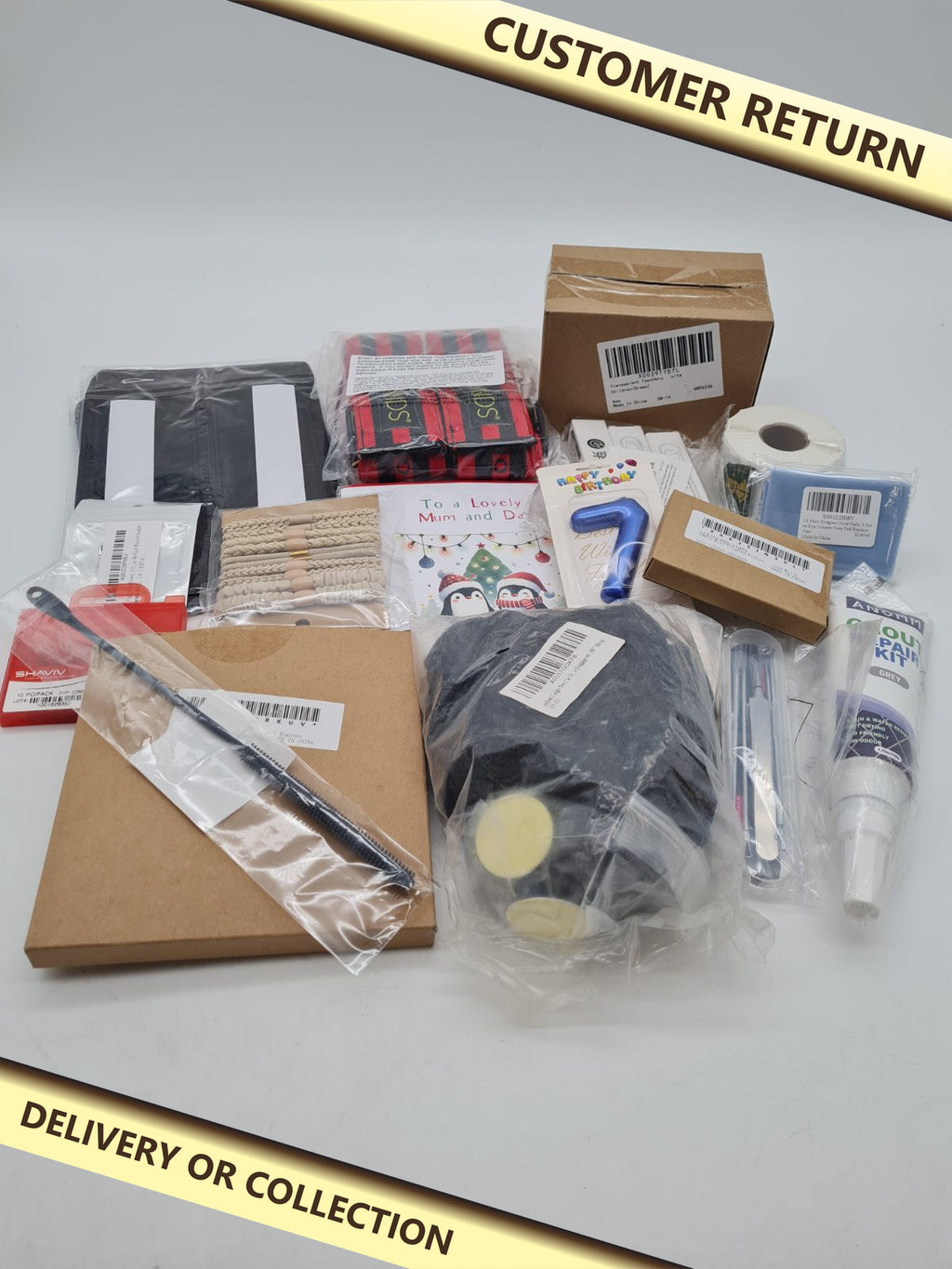 Bundle of a variety of products. â€” photograph 1 — Customer return; auction delivery information shown on image