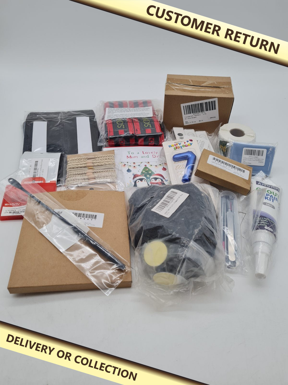 Bundle of a variety of products. â€” photograph 1 — Customer return; auction delivery information shown on image