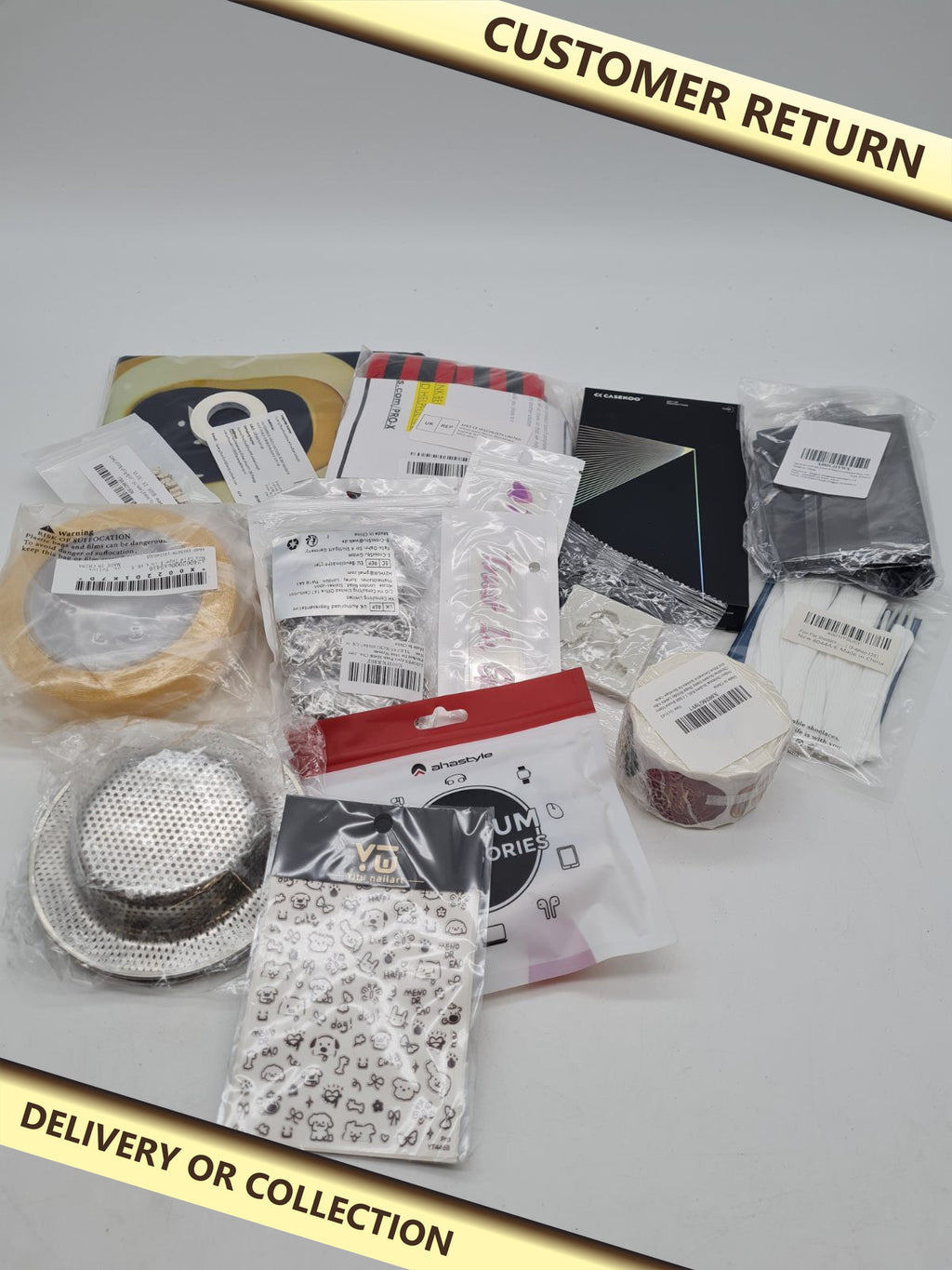 Variety bundles with a good mix of items â€” photograph 1 — Customer return; auction delivery information shown on image