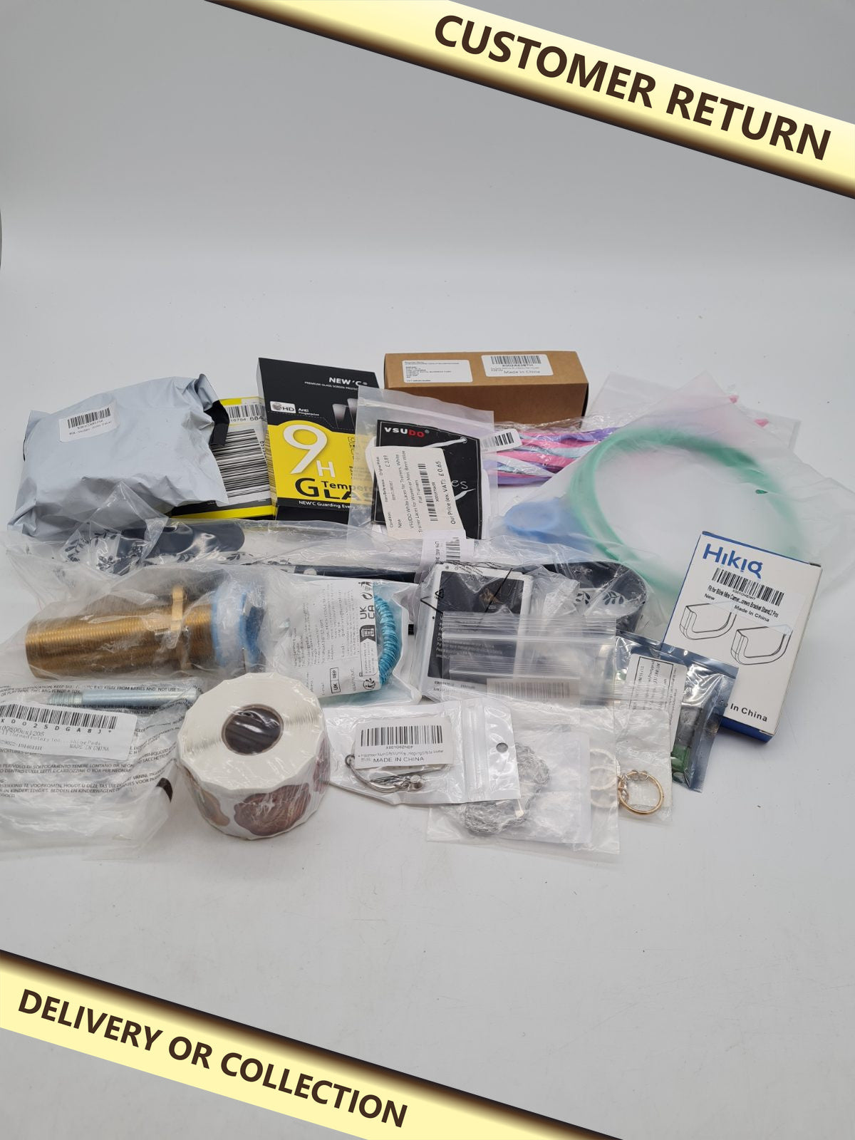 Variety mixed bundle â€” photograph 1 — Customer return; auction delivery information shown on image