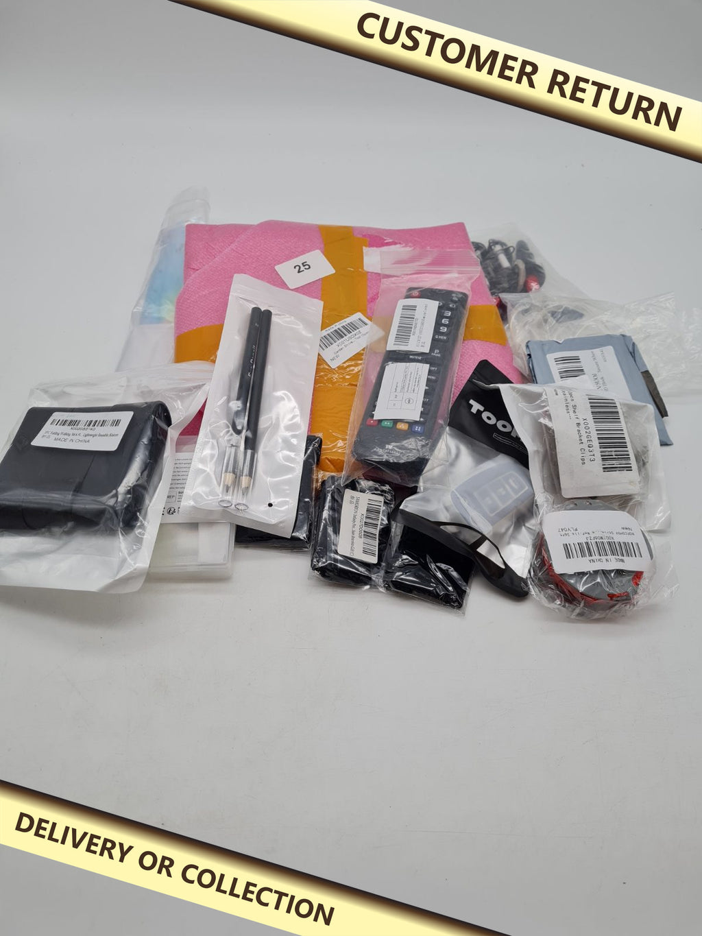 Mixed bundle â€” photograph 1 — Customer return; auction delivery information shown on image