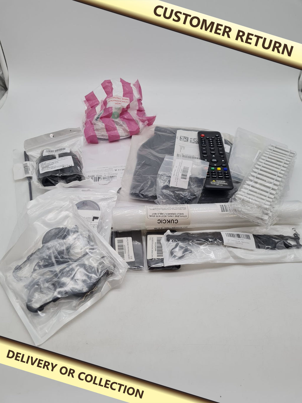 Random bundle â€” photograph 1 — Customer return; auction delivery information shown on image