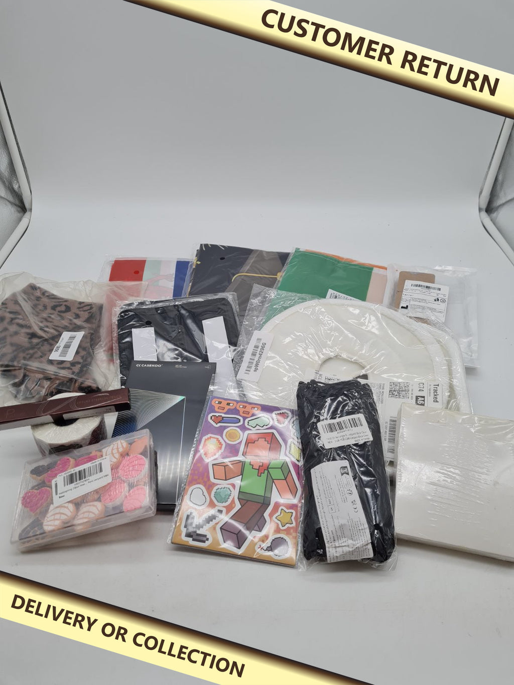 Bundle of random items â€” photograph 1 — Customer return; auction delivery information shown on image
