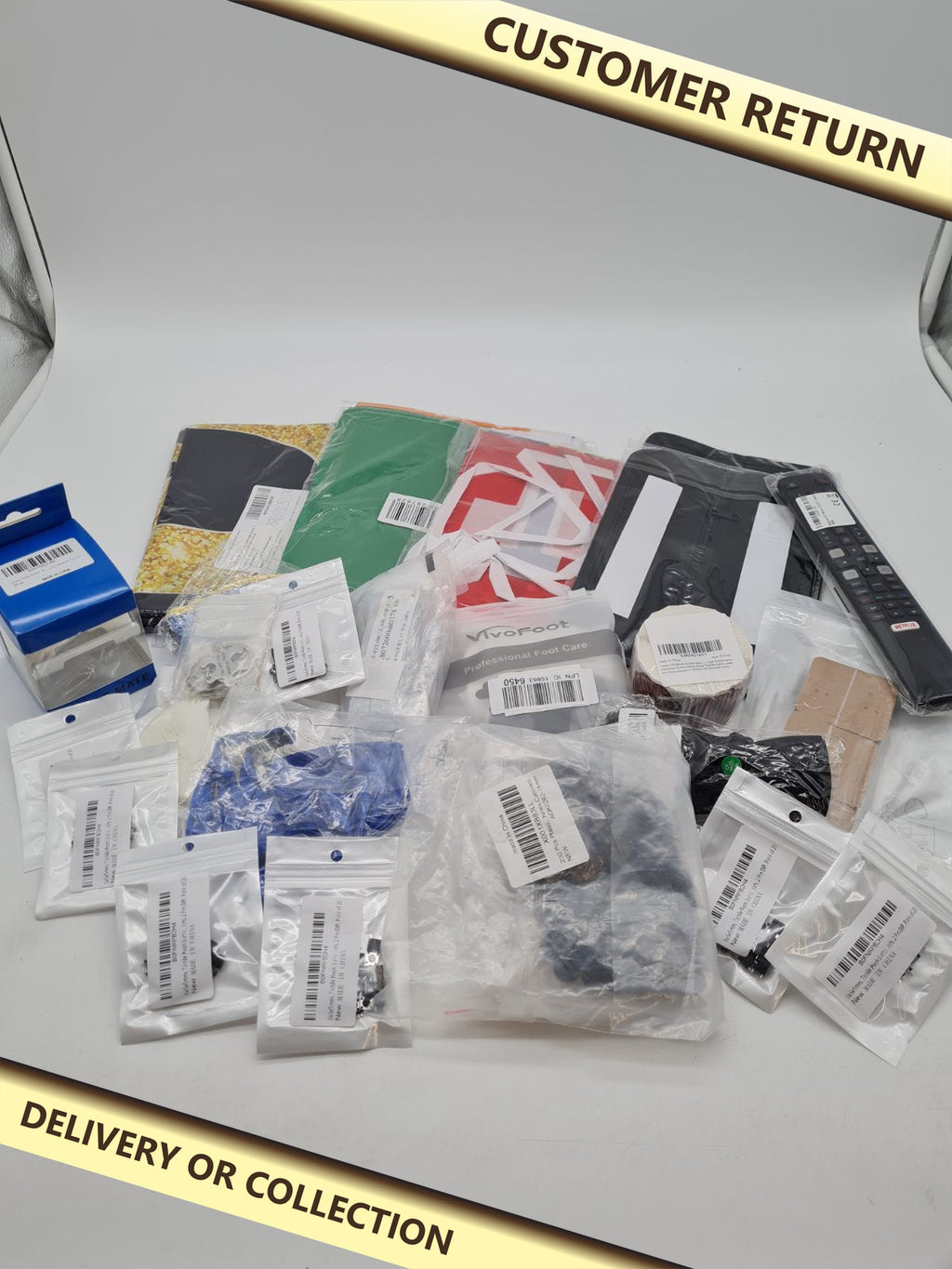 Random bundle â€” photograph 1 — Customer return; auction delivery information shown on image