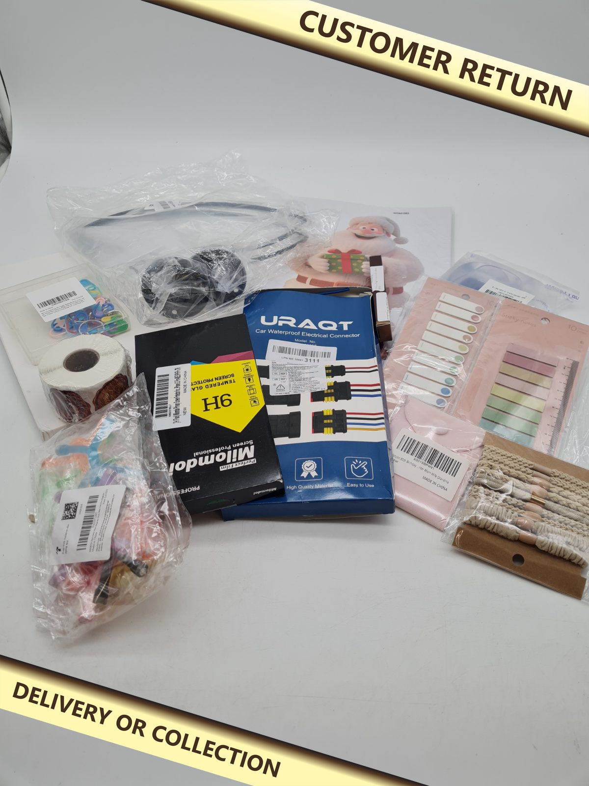 Random bundle. — photograph 1 — Customer return; auction delivery information shown on image