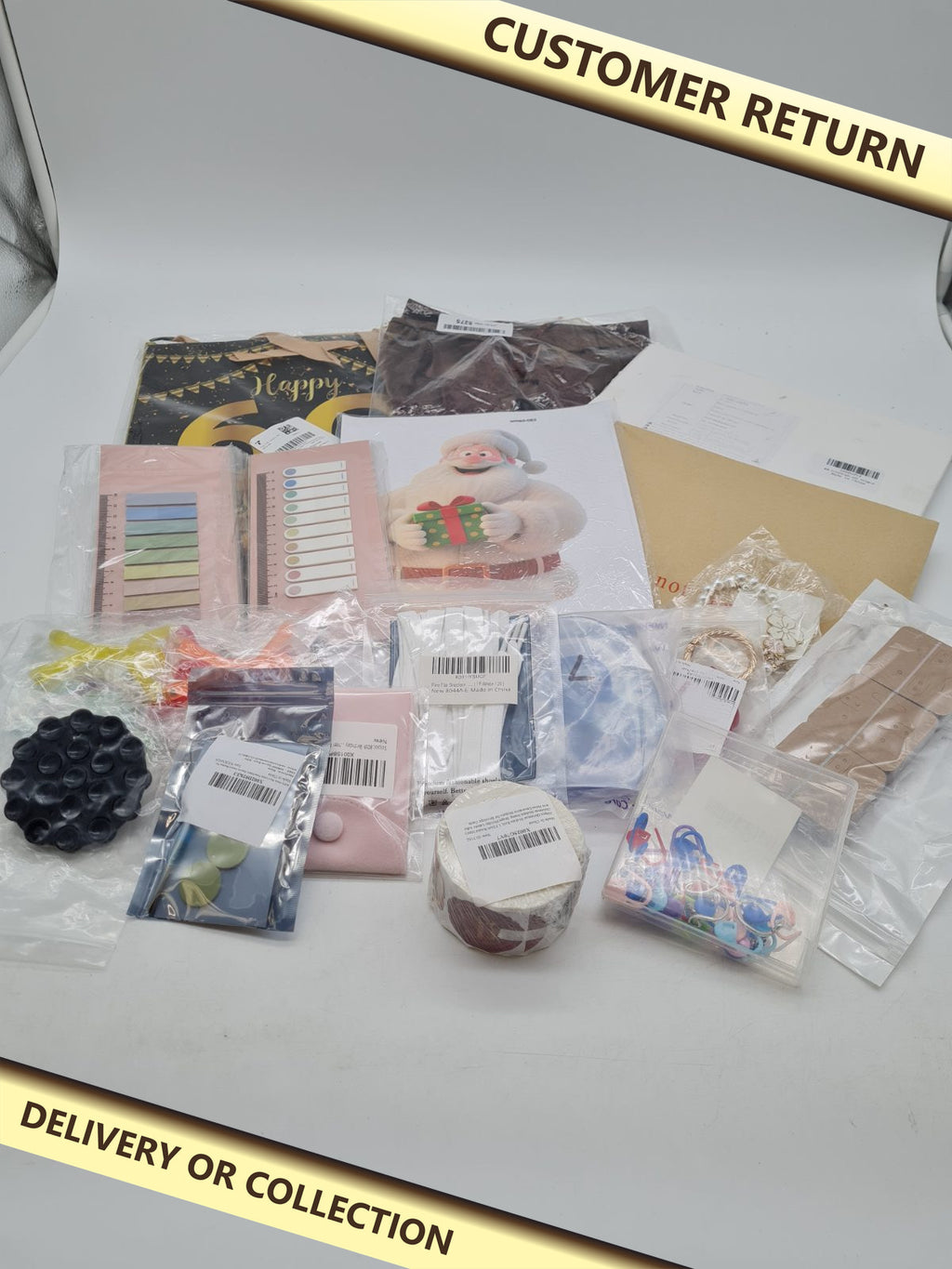 Variety bundle — photograph 1 — Customer return; auction delivery information shown on image