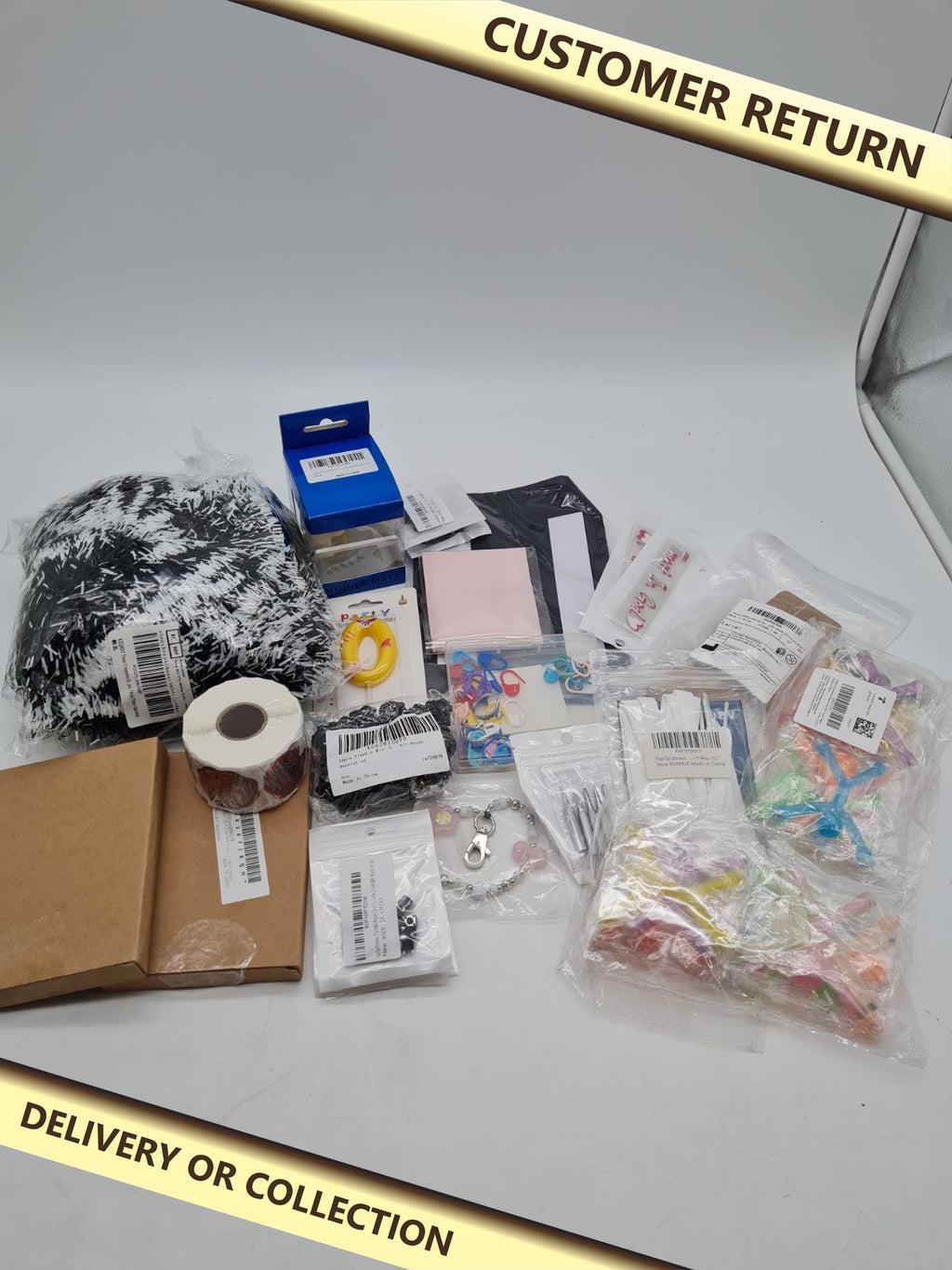 Random bundle â€” photograph 1 — Customer return; auction delivery information shown on image