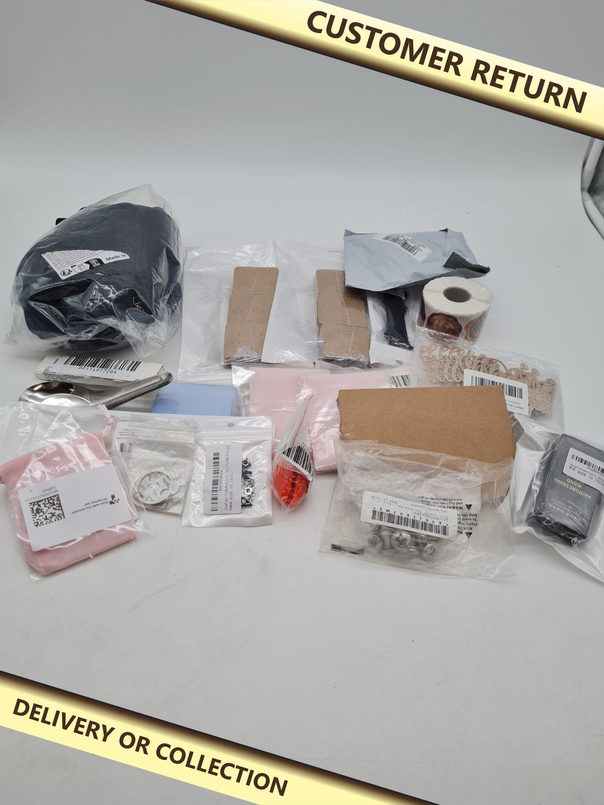 Random bundle — photograph 1 — Customer return; auction delivery information shown on image