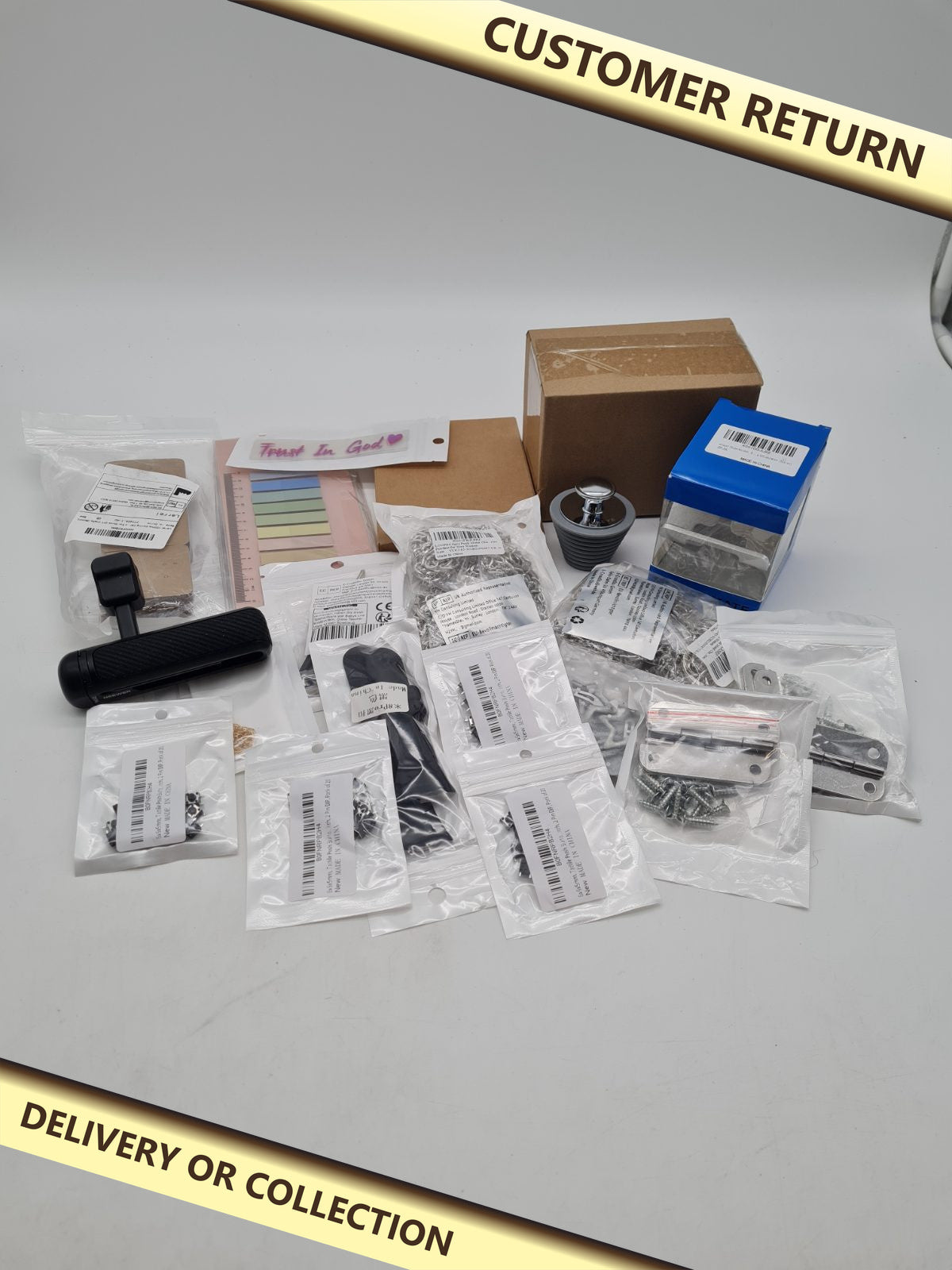 Mixed variety bundle â€” photograph 1 — Customer return; auction delivery information shown on image
