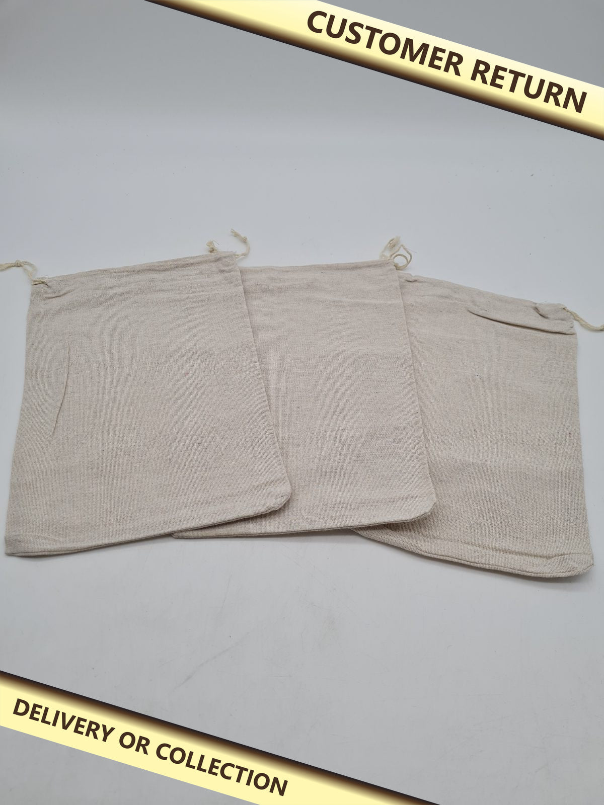 Drawstring Fabric Gift Bags — photograph 1 — Customer return; auction delivery information shown on image