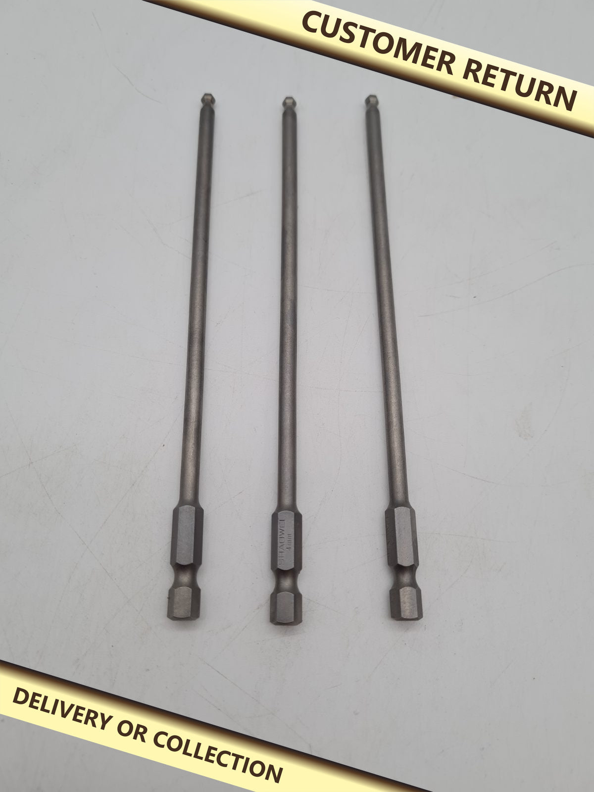 3-Piece 4mm Extra-Long Ball-End Hex Bit Set — photograph 1 — Customer return; auction delivery information shown on image