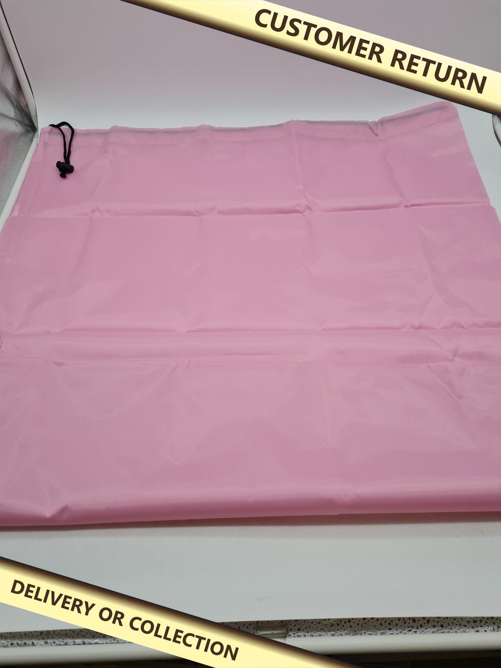 Drawstring pink Laundry Bag — photograph 1 — Customer return; auction delivery information shown on image