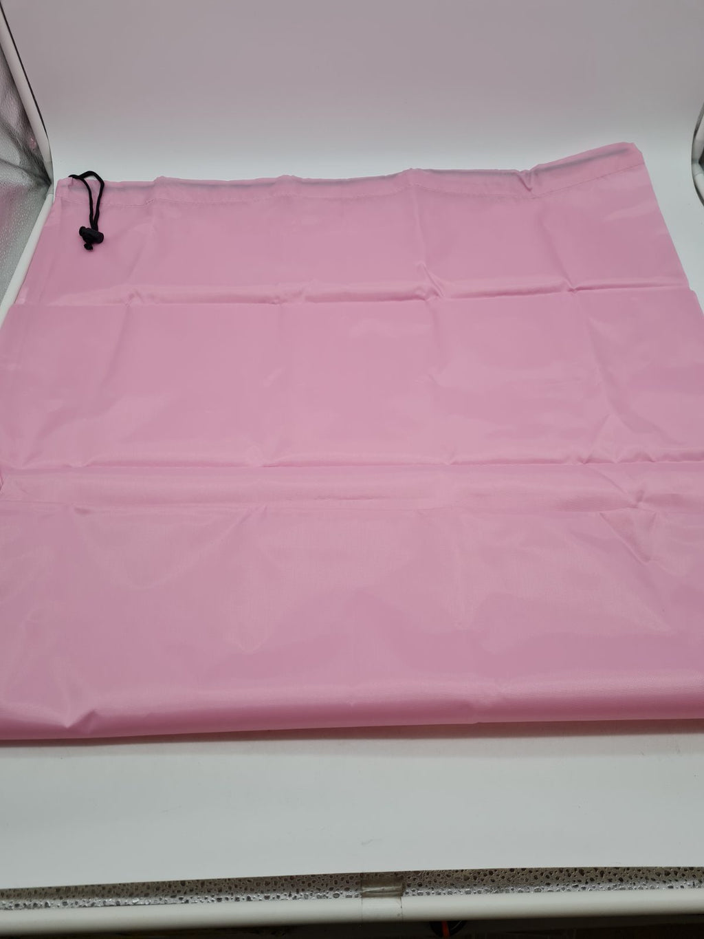 Drawstring pink Laundry Bag — photograph 1