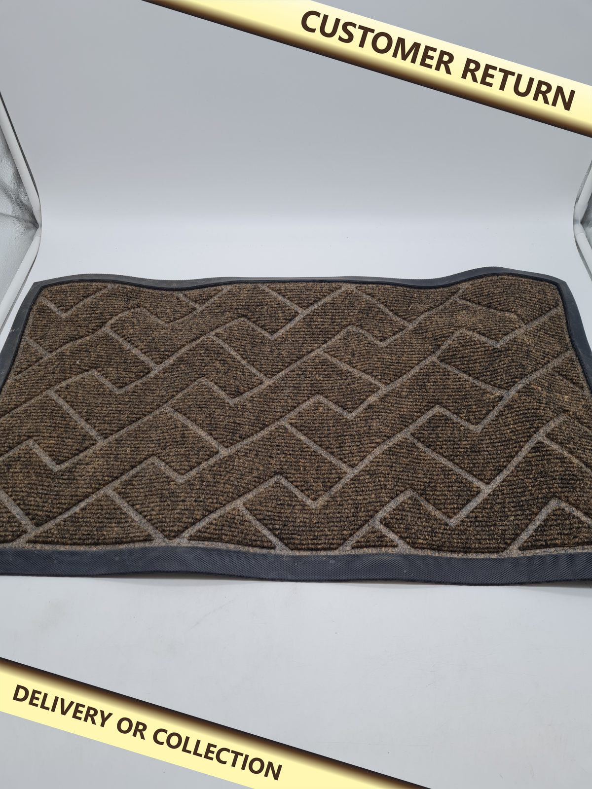 Rubber-Backed  door mat â€” photograph 1 — Customer return; auction delivery information shown on image