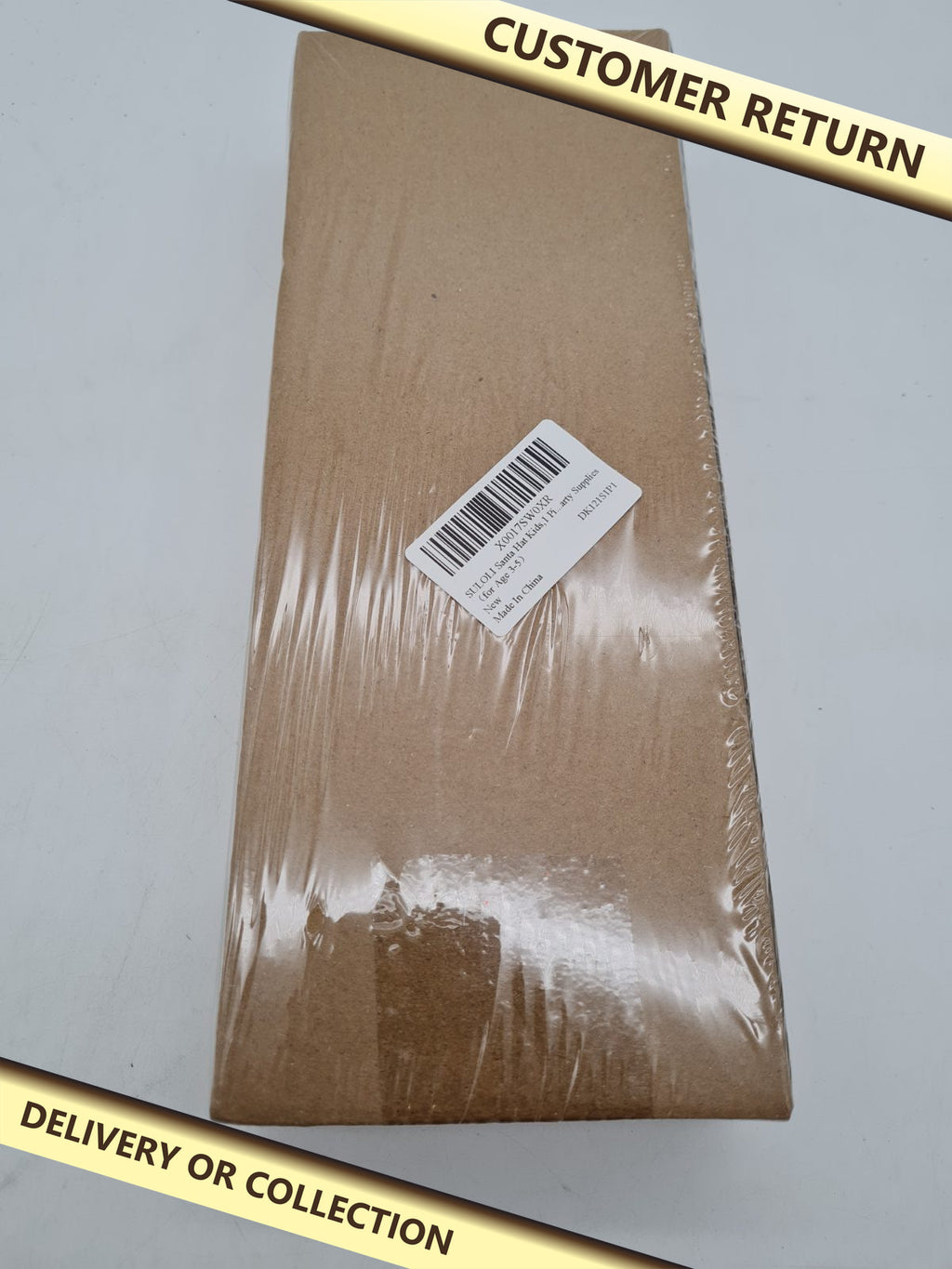 Children's Santa Hat DK121S1P1 â€” photograph 1 — Customer return; auction delivery information shown on image
