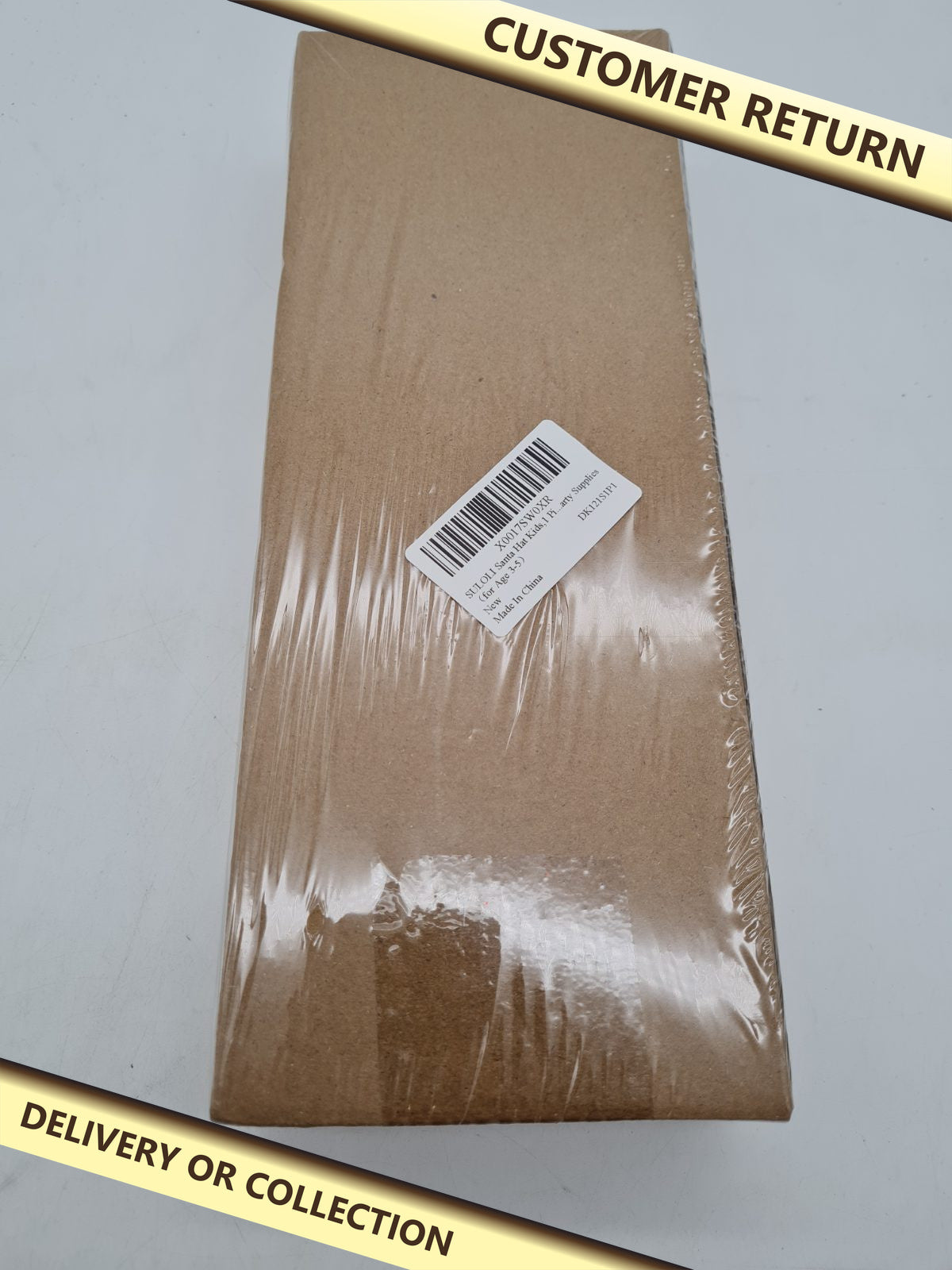 Children's Santa Hat DK121S1P1 â€” photograph 1 — Customer return; auction delivery information shown on image