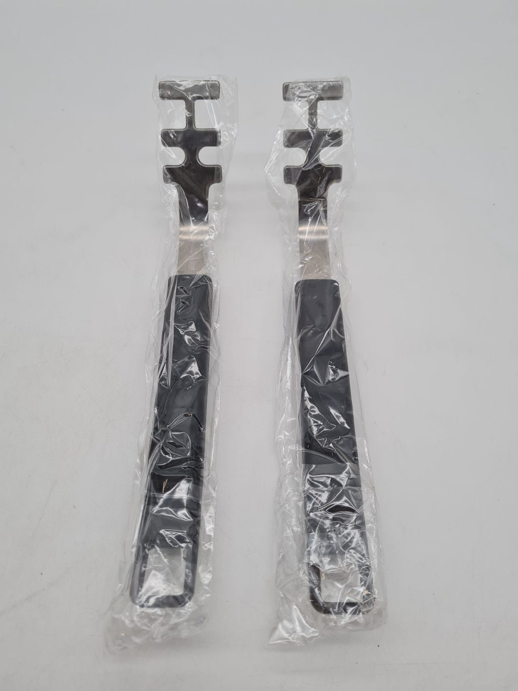 Pair of Hot Dish Grippers â€” photograph 1