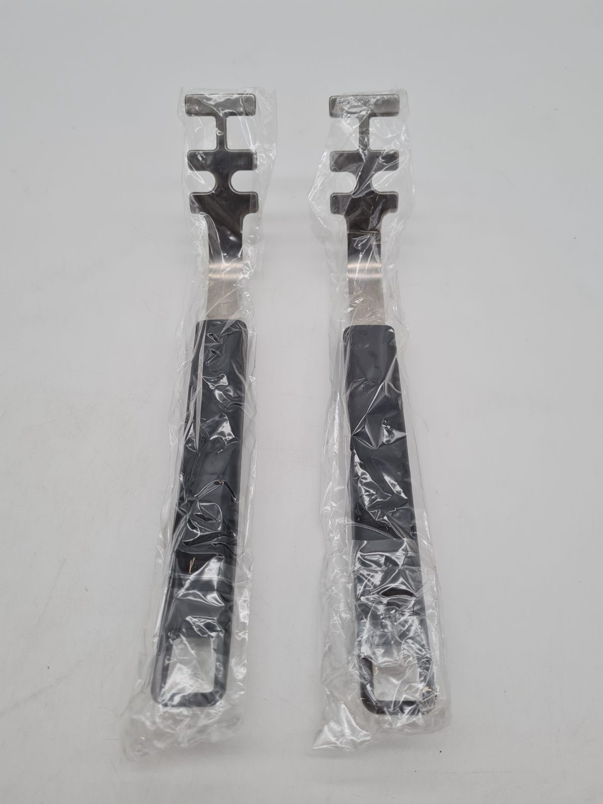 Pair of Hot Dish Grippers â€” photograph 1