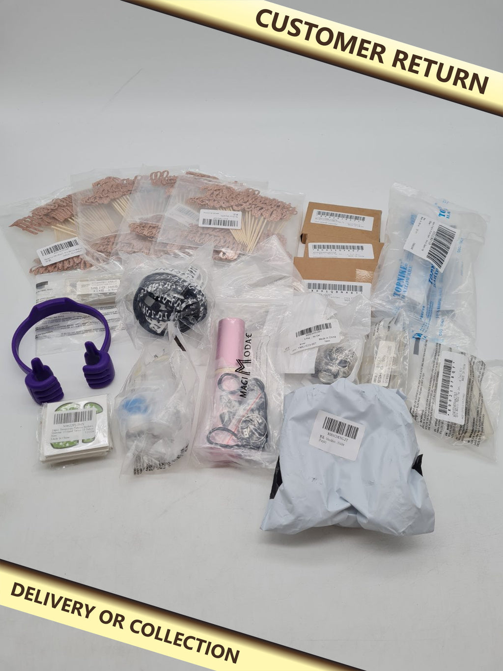 Mixed variety bundle â€” photograph 1 — Customer return; auction delivery information shown on image