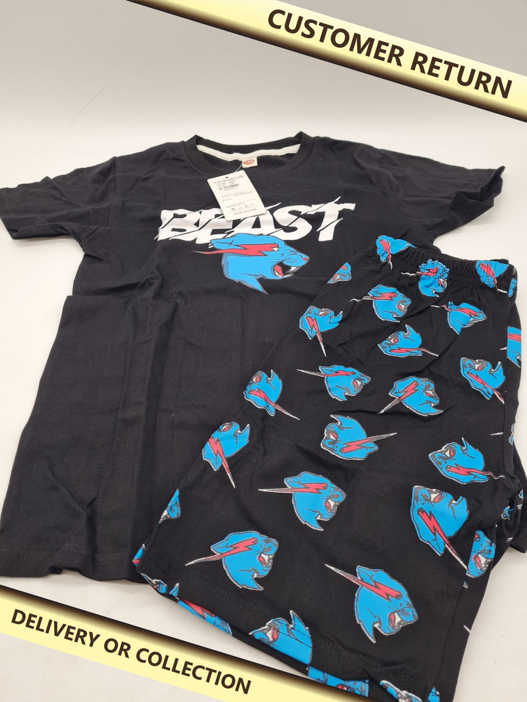 Children's  Beast Graphic T-Shirt and Shorts Set Size 150 â€” photograph 1 — Customer return; auction delivery information shown on image
