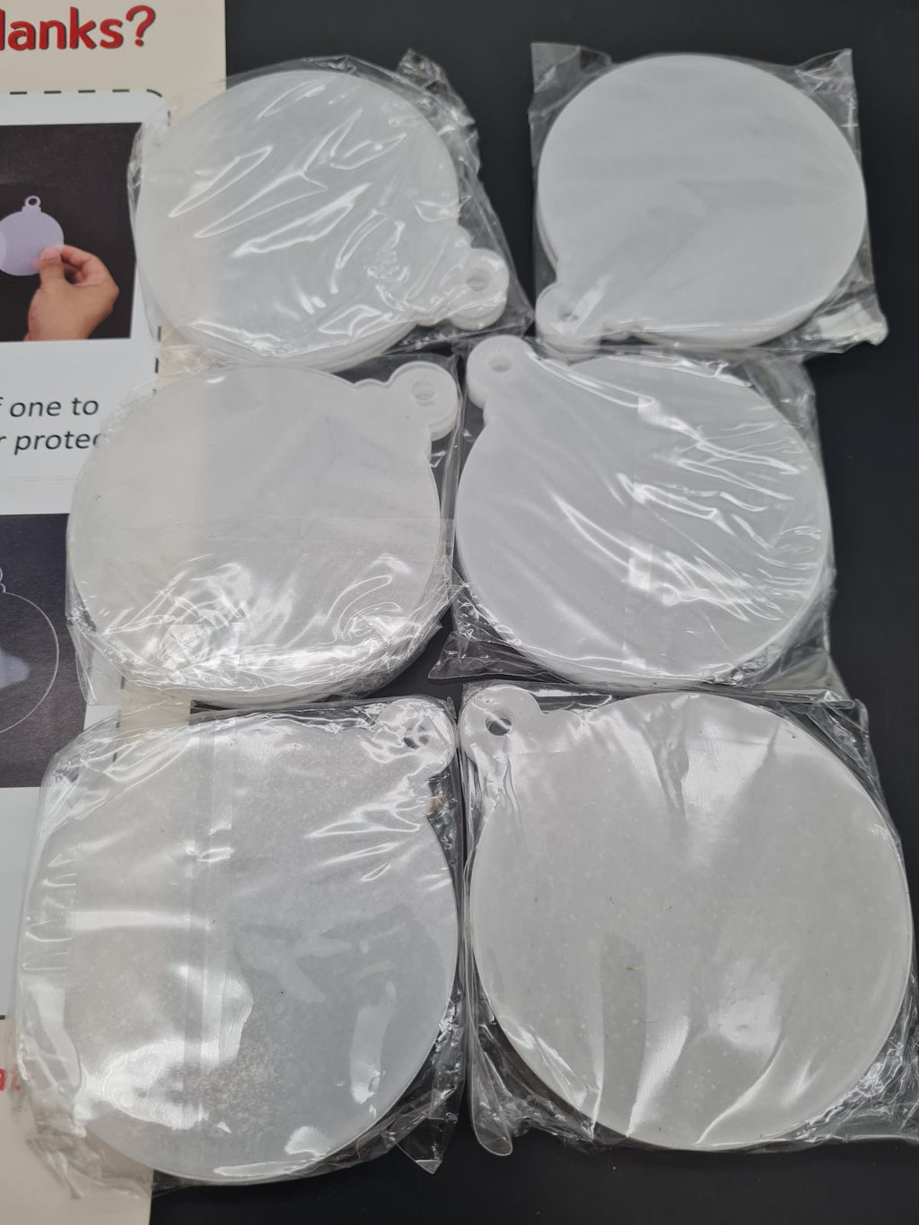 Round Acrylic Craft Blanks with Hanging Holes â€” photograph 1