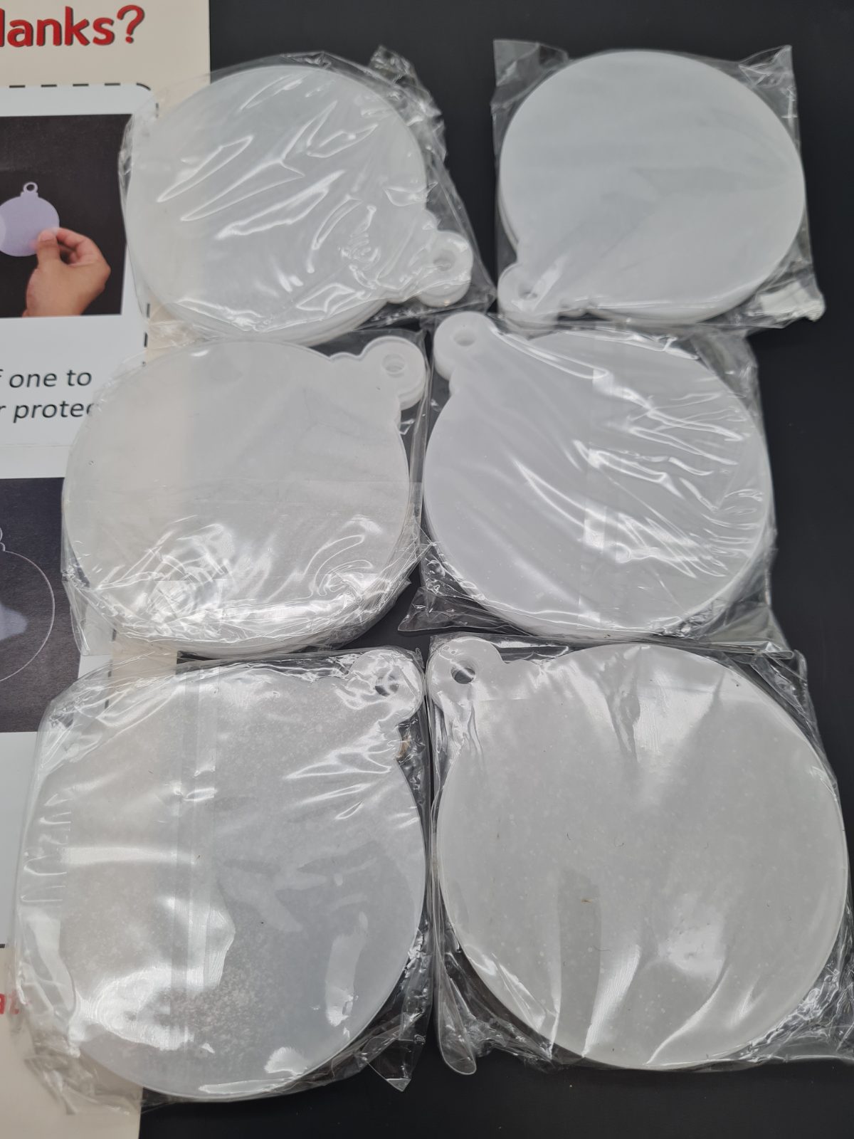 Round Acrylic Craft Blanks with Hanging Holes â€” photograph 1