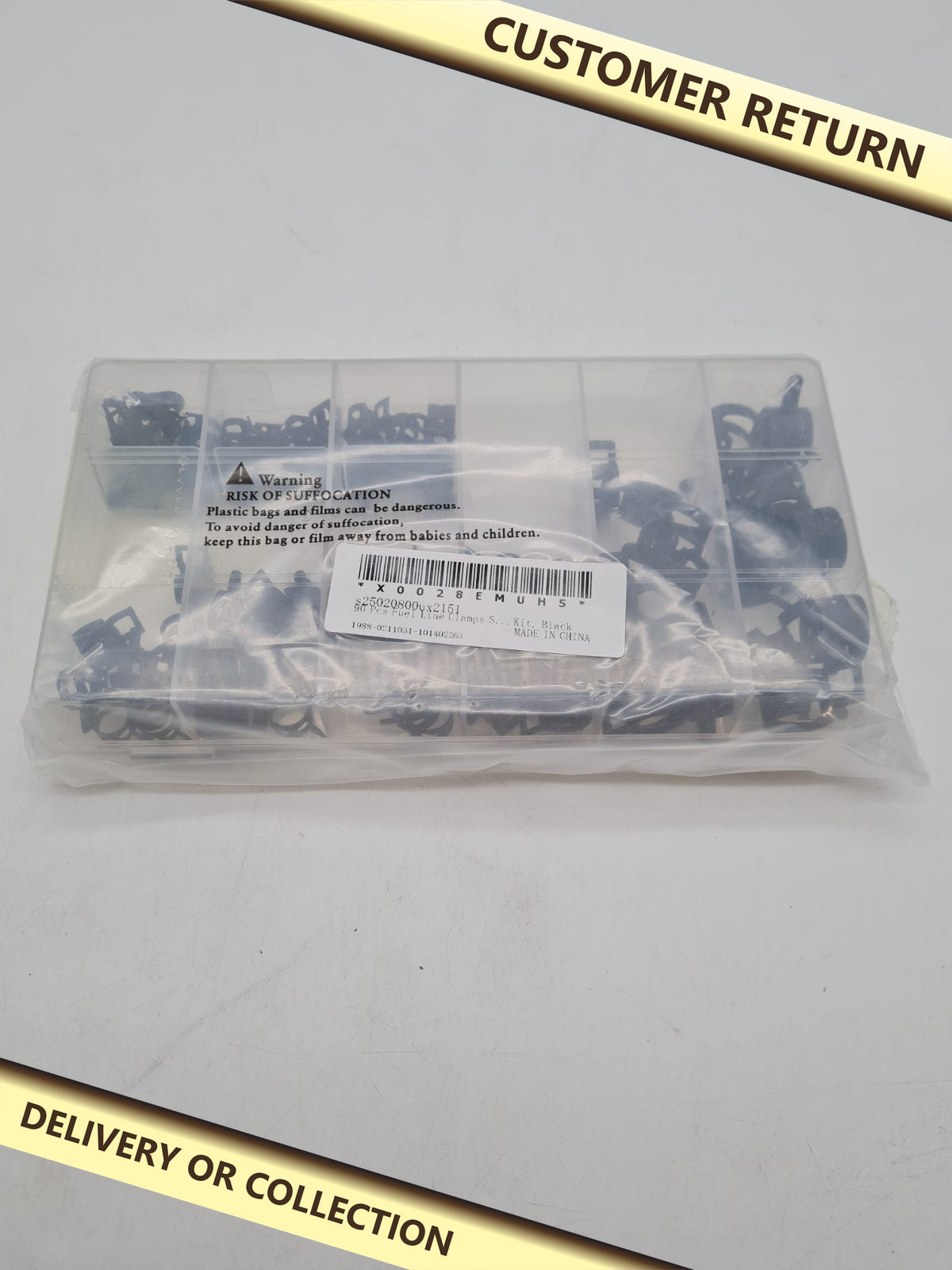 Assorted Fuel Line Spring Clamp Kit â€” photograph 1 — Customer return; auction delivery information shown on image